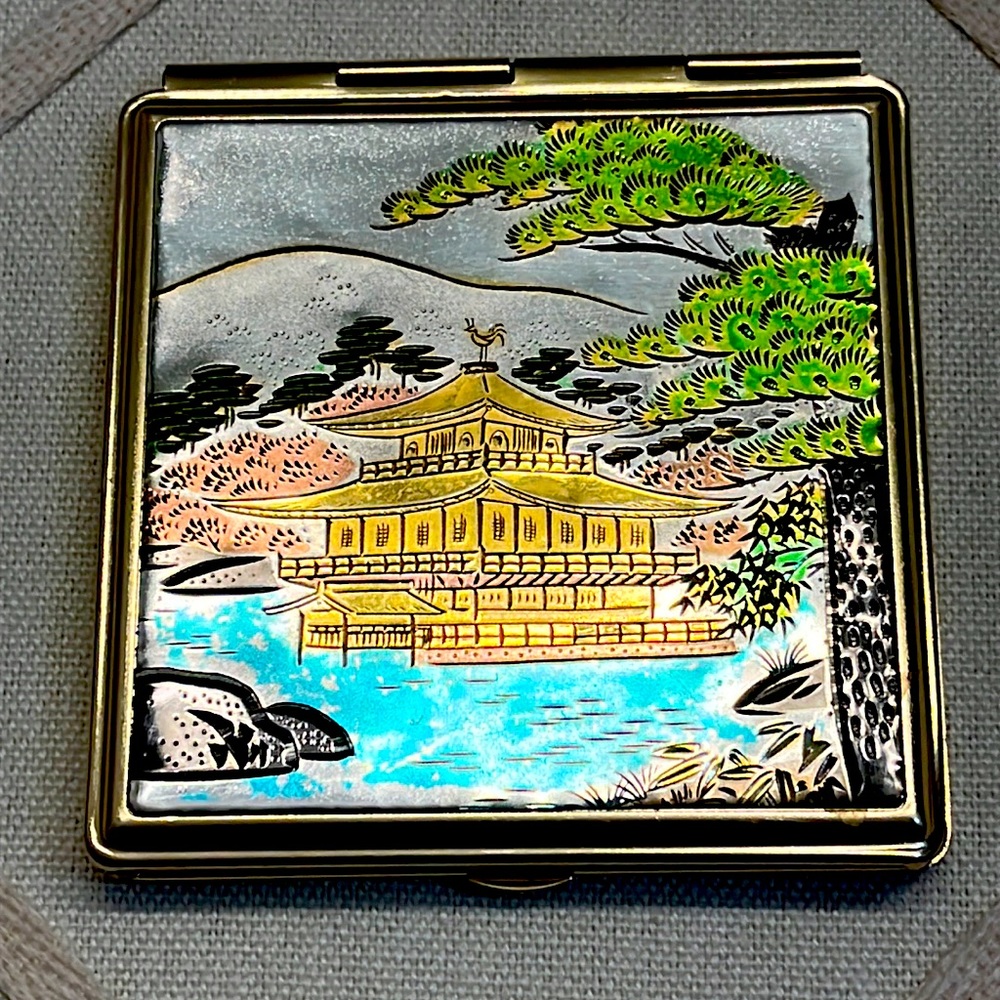 Vintage Asian tea house scene on compact Front